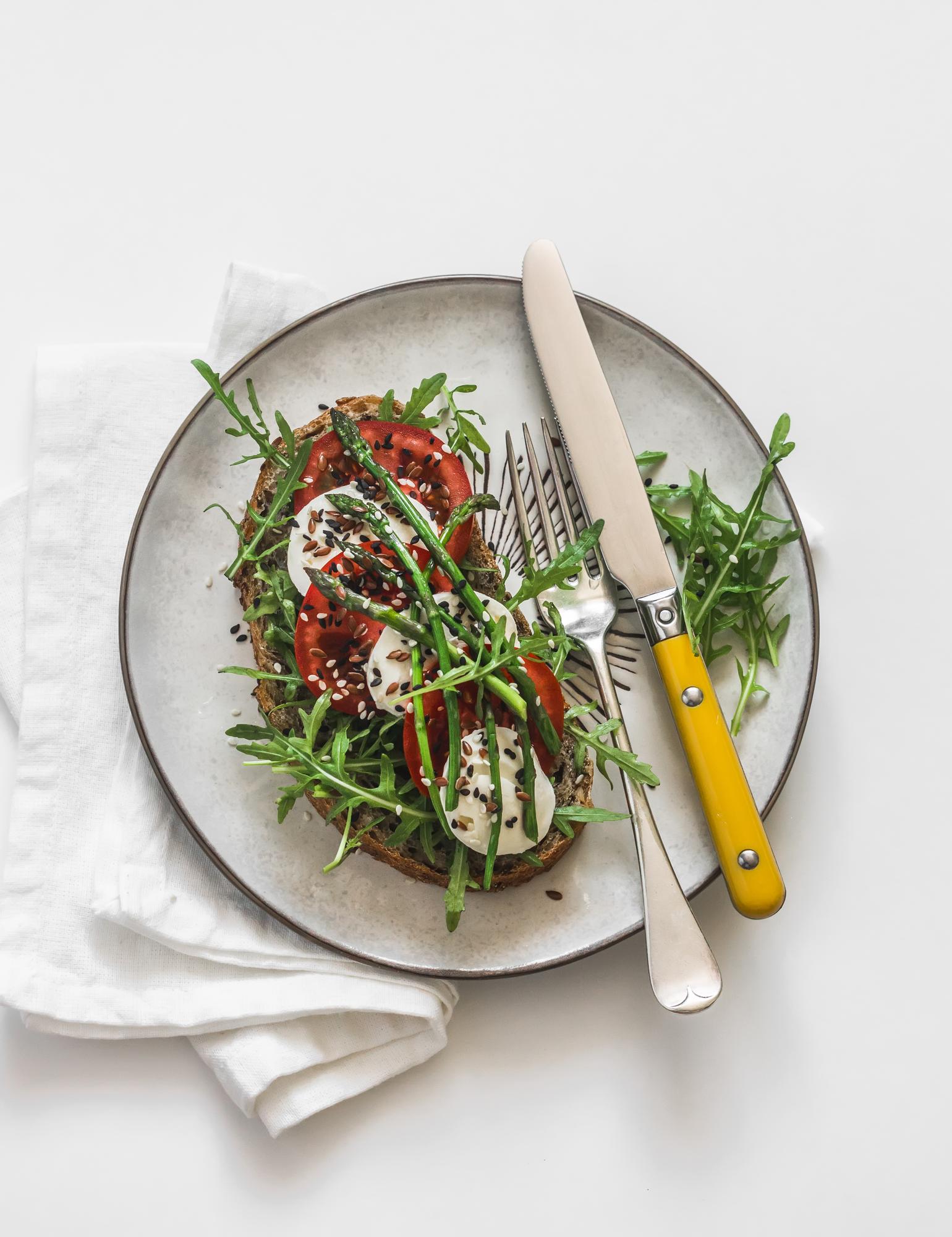 large spread of plated meals in studio light