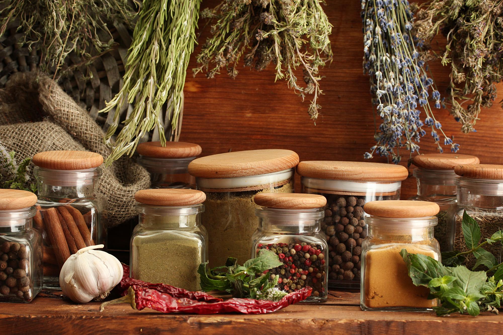 close-up of herbs and spice blends in small jars